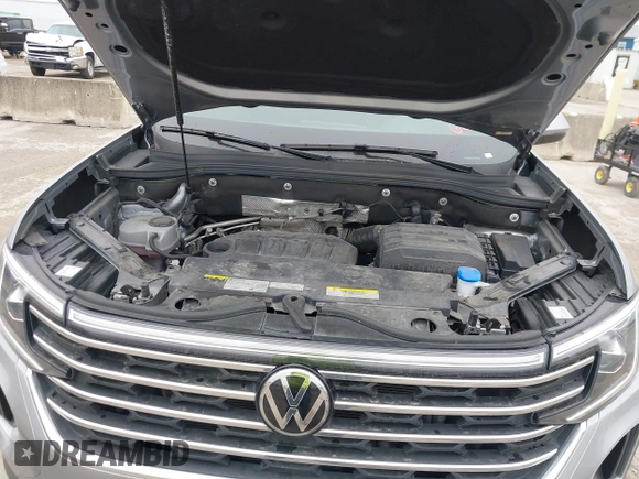 2024 Volkswagen Atlas SE z VIN 1V2JR2CA1RC537982, wystawiony jako IAAI lot #41429786 z przebiegiem 33 846 mil mil oraz . Historia ofert i sprzedaży dostępna na DreamBid. Obrazek 10.