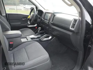 2023 Nissan Frontier SV with VIN 1N6ED1EK7PN609865, listed as a IAAI auction lot 42242070 with 56,462 mi miles and . Bid and sale history available at DreamBid. Image 5.