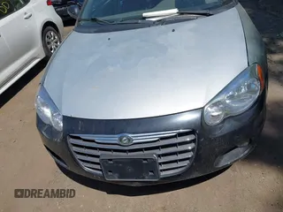 2005 Chrysler Sebring Touring z VIN 1C3EL55R85N706262, wystawiony jako IAAI lot #42254572 z przebiegiem 189 616 mil mil oraz . Historia ofert i sprzedaży dostępna na DreamBid. Obrazek 6.
