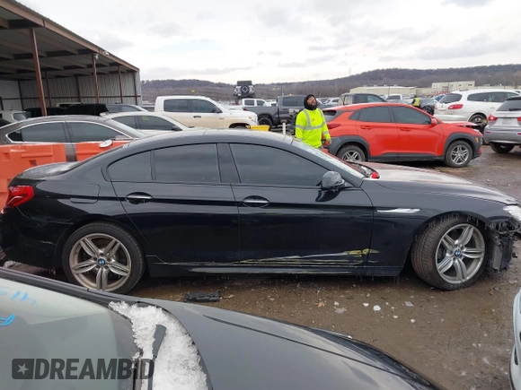 2015 BMW 6 Series 640i with VIN WBA6A0C55FGB53603, listed as a IAAI auction lot 41543996 with 71,046 mi miles and . Bid and sale history available at DreamBid. Image 14.