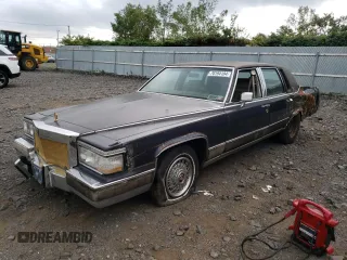 1991 Cadillac Brougham z VIN 1G6DW54EXMR701457, wystawiony jako Copart lot #70194104 z przebiegiem Nie podano mil oraz Nie do naprawy. Historia ofert i sprzedaży dostępna na DreamBid. Obrazek 1.
