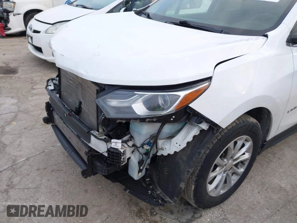 2020 Chevrolet Equinox LT z VIN 3GNAXKEV9LS553766, wystawiony jako IAAI lot #41395065 z przebiegiem 123 219 mil mil oraz . Historia ofert i sprzedaży dostępna na DreamBid. Obrazek 19.