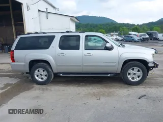 2011 Chevrolet Suburban LT with VIN 1GNSKJE32BR330742, listed as a IAAI auction lot 42435335 with 191,663 mi miles and . Bid and sale history available at DreamBid. Image 14.