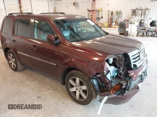2012 Honda Pilot Touring z VIN 5FNYF4H91CB033638, wystawiony jako IAAI lot #42376592 z przebiegiem 217 984 mil mil oraz . Historia ofert i sprzedaży dostępna na DreamBid. Obrazek 1.