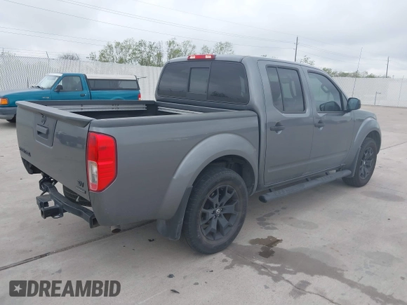2020 Nissan Frontier SV with VIN 1N6ED0EA2LN701042, listed as a IAAI auction lot 41865224 with 67,910 mi miles and . Bid and sale history available at DreamBid. Image 4.