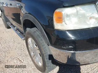 2005 Ford F-150 XLT with VIN 1FTRW12W85KC74796, listed as a IAAI auction lot 41761901 with 235,009 mi miles. Bid and sale history available at carsss.com. Image 6.