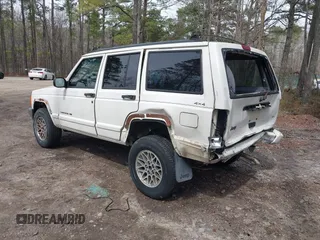 1998 Jeep Cherokee Limited with VIN 1J4FJ78S5WL247179, listed as a IAAI auction lot 41738363 with 233,402 mi miles. Bid and sale history available at carsss.com. Image 3.