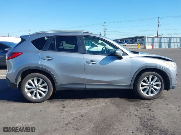 2014 Mazda CX-5 Grand Touring with VIN JM3KE2DY9E0323497, listed as a IAAI auction lot 41678360 with 216,795 mi miles. Bid and sale history available at carsss.com. Image 13.