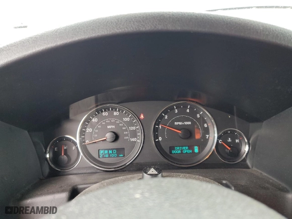 2006 Jeep Commander with VIN 1J8HG48K36C356793, listed as a Copart auction lot 52071605 with 218,100 mi miles and Salvage Title. Bid and sale history available at carsss.com. Image 9.