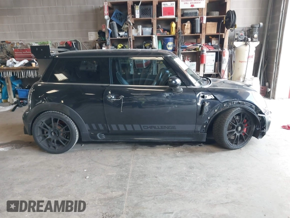 2008 MINI Hardtop S with VIN WMWMF73568TT87273, listed as a IAAI auction lot 41996859 with 107,671 mi miles and . Bid and sale history available at DreamBid. Image 14.