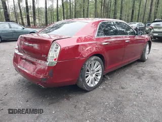 2014 Chrysler 300 C z VIN 2C3CCAET9EH157059, wystawiony jako IAAI lot #41979473 z przebiegiem 111 099 mil mil oraz . Historia ofert i sprzedaży dostępna na DreamBid. Obrazek 4.