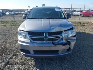 2018 Dodge Journey SE with VIN 3C4PDDAG9JT189824, listed as a IAAI auction lot 42208115 with 97,035 mi miles and . Bid and sale history available at DreamBid. Image 12.