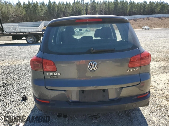 2014 Volkswagen Tiguan SE with VIN WVGAV3AX8EW619044, listed as a Copart auction lot 46990185 with 171,972 mi miles and Salvage title. Bid and sale history available at DreamBid. Image 6.