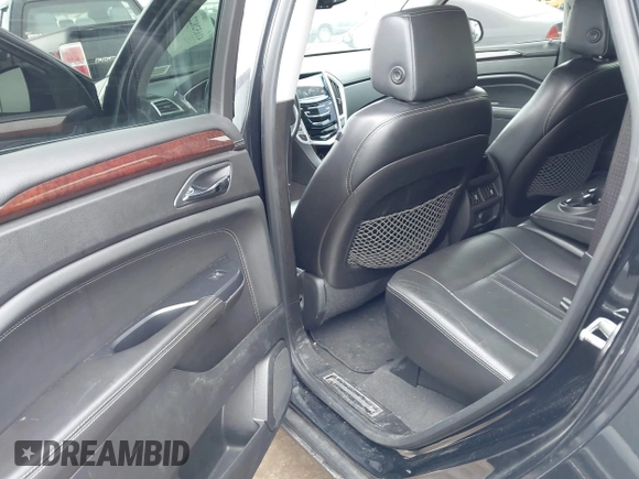 2013 Cadillac SRX Performance Collection with VIN 3GYFNHE33DS527519, listed as a IAAI auction lot 41652822 with 201,580 mi miles. Bid and sale history available at carsss.com. Image 8.