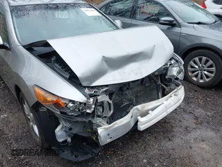2010 Acura TSX with VIN JH4CU2F64AC031288, listed as a IAAI auction lot 42023406 with 144,192 mi miles. Bid and sale history available at carsss.com. Image 6.