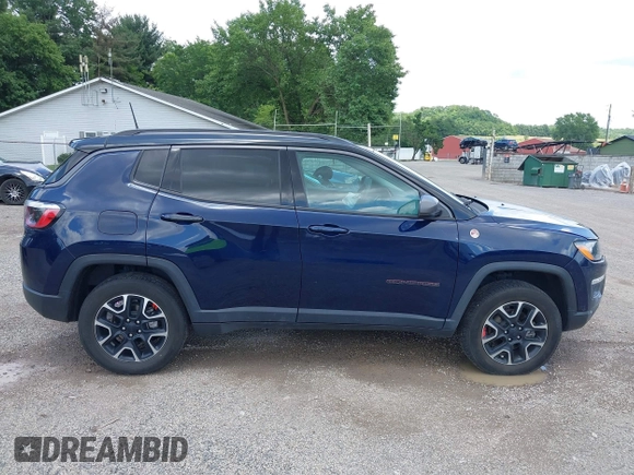 2021 Jeep Compass Trailhawk with VIN 3C4NJDDB0MT590442, listed as a IAAI auction lot 42543530 with 66,669 mi miles and . Bid and sale history available at DreamBid. Image 13.