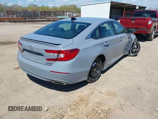2022 Honda Accord Sedan Sport SE with VIN 1HGCV1F41NA033980, listed as a IAAI auction lot 41879036 with 54,472 mi miles. Bid and sale history available at carsss.com. Image 4.