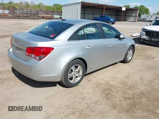 2014 Chevrolet Cruze 1LT with VIN 1G1PC5SBXE7320337, listed as a IAAI auction lot 42010404 with 69,270 mi miles and . Bid and sale history available at DreamBid. Image 4.