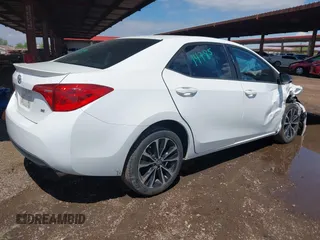 2017 Toyota Corolla L with VIN 2T1BURHE8HC814965, listed as a IAAI auction lot 42387645 with 230,303 mi miles and . Bid and sale history available at DreamBid. Image 4.