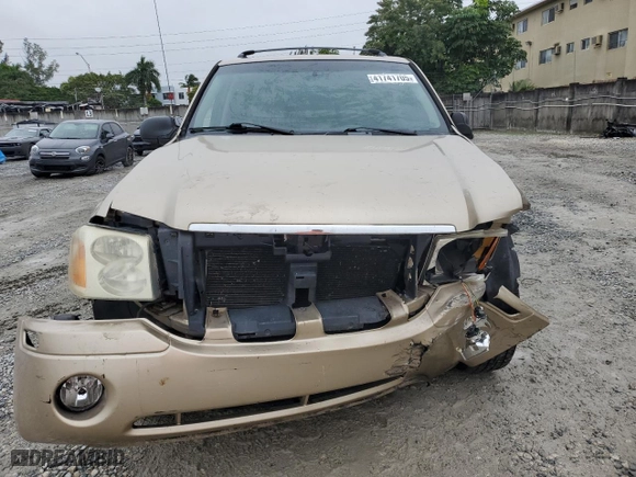 2006 GMC Envoy SLE with VIN 1GKDS13S062113933, listed as a Copart auction lot 41741705 with NaN miles and Salvage Title. Bid and sale history available at carsss.com. Image 5.