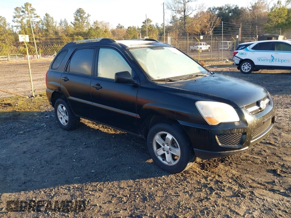 2009 Kia Sportage LX with VIN KNDJE723397585036, listed as a IAAI auction lot 41331868 with 208,268 mi miles and . Bid and sale history available at carsss.com. Image 1.