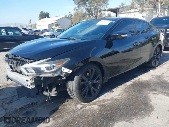 2018 Nissan Maxima S with VIN 1N4AA6AP9JC388366, listed as a IAAI auction lot 41842042 with 103,597 mi miles and . Bid and sale history available at DreamBid. Image 20.