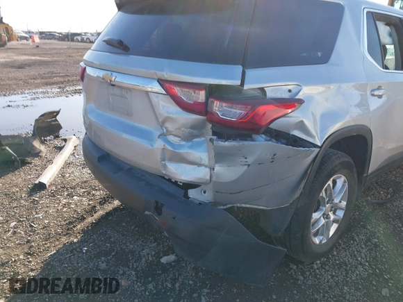 2020 Chevrolet Traverse LS z VIN 1GNERFKW8LJ183878, wystawiony jako IAAI lot #41719712 z przebiegiem 76 165 mil mil oraz . Historia ofert i sprzedaży dostępna na DreamBid. Obrazek 6.