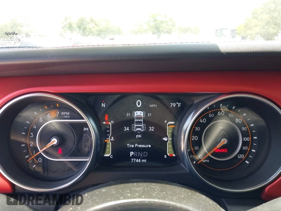 2023 Jeep Wrangler Rubicon with VIN 1C4JJXFG0PW522651, listed as a IAAI auction lot 42112210 with 7,744 mi miles and . Bid and sale history available at DreamBid. Image 7.