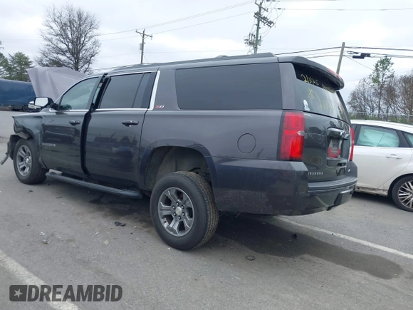 2017 Chevrolet Suburban LT z VIN 1GNSKHKC2HR315082, wystawiony jako IAAI lot #41545420 z przebiegiem 117 565 mil mil oraz . Historia ofert i sprzedaży dostępna na DreamBid. Obrazek 3.