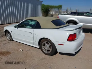2004 Ford Mustang Deluxe with VIN 1FAFP44674F134492, listed as a IAAI auction lot 42562080 with 145,600 mi miles and . Bid and sale history available at DreamBid. Image 3.