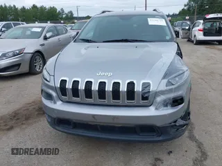 2014 Jeep Cherokee Latitude with VIN 1C4PJLCS1EW105984, listed as a IAAI auction lot 42242732 with 89,325 mi miles and . Bid and sale history available at DreamBid. Image 17.