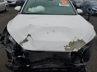 2018 Hyundai Tucson SEL with VIN KM8J3CA41JU712523, listed as a Copart auction lot 56929885 with 91,131 mi miles and Salvage title. Bid and sale history available at DreamBid. Image 11.