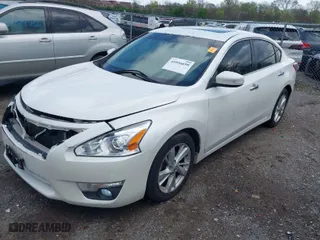 2013 Nissan Altima 2.5 SL with VIN 1N4AL3AP4DC223158, listed as a IAAI auction lot 41956699 with 207,115 mi miles. Bid and sale history available at carsss.com. Image 2.
