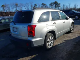 2007 Suzuki XL7 Luxury with VIN 2S3DB417376120344, listed as a IAAI auction lot 41766589 with 999,999 mi miles. Bid and sale history available at carsss.com. Image 4.
