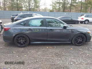 2025 Honda Civic Sport z VIN 2HGFE2F59SH504928, wystawiony jako IAAI lot #41779524 z przebiegiem 11 332 mil mil oraz . Historia ofert i sprzedaży dostępna na DreamBid. Obrazek 13.
