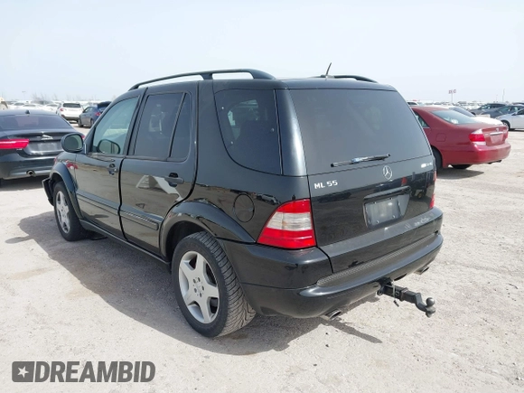 2001 Mercedes-Benz M-Class AMG with VIN 4JGAB74E51A272841, listed as a IAAI auction lot 41734340 with 168,387 mi miles. Bid and sale history available at carsss.com. Image 3.