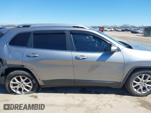 2016 Jeep Cherokee 75th Anniversary with VIN 1C4PJLCB1GW217638, listed as a IAAI auction lot 41689623 with 124,630 mi miles and . Bid and sale history available at DreamBid. Image 13.