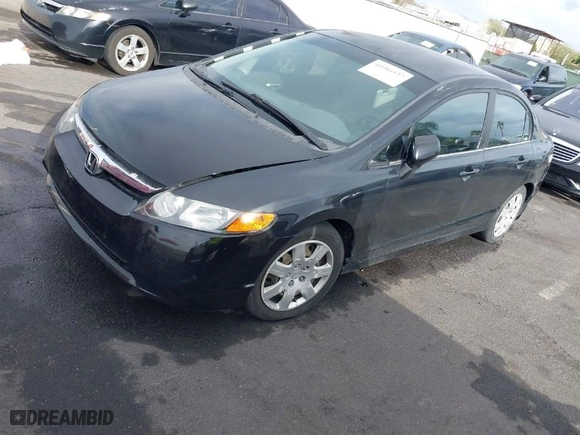 2007 Honda Civic Sdn LX with VIN 1HGFA16517L012569, listed as a IAAI auction lot 41906527 with 235,602 mi miles. Bid and sale history available at carsss.com. Image 2.