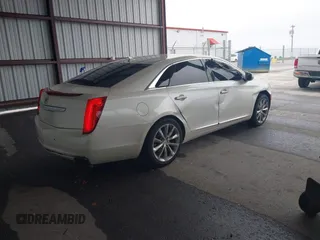 2014 Cadillac XTS Luxury with VIN 2G61M5S31E9210460, listed as a IAAI auction lot 41602087 with 1 mi miles. Bid and sale history available at carsss.com. Image 4.
