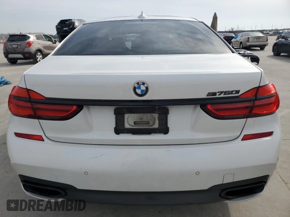2019 BMW 7 Series 750i with VIN WBA7F0C59KGM24241, listed as a Copart auction lot 45171345 with 60,443 mi miles and Salvage title. Bid and sale history available at DreamBid. Image 6.