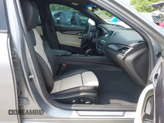 2023 Cadillac CT5 Sport z VIN 1G6DP5RK7P0113696, wystawiony jako IAAI lot #41904906 z przebiegiem 89 191 mil mil oraz . Historia ofert i sprzedaży dostępna na DreamBid. Obrazek 5.