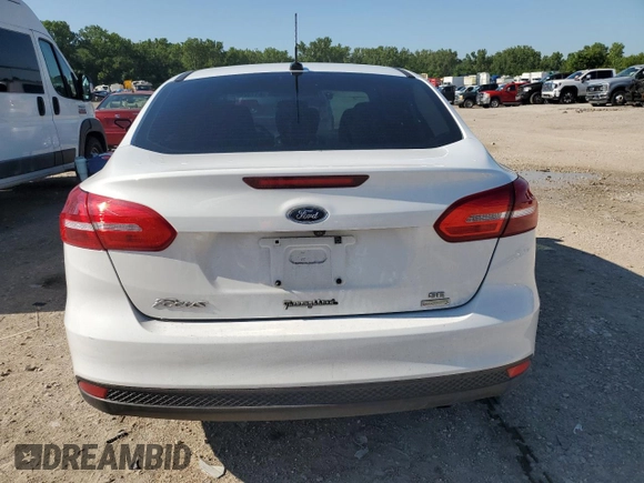 2017 Ford Focus SE with VIN 1FADP3FE8HL284169, listed as a Copart auction lot 61732695 with 70,443 mi miles and Salvage title. Bid and sale history available at DreamBid. Image 6.