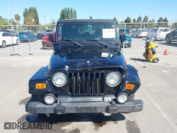 2001 Jeep Wrangler Sahara z VIN 1J4FA59S41P313113, wystawiony jako IAAI lot #42266173 z przebiegiem 125 792 mil mil oraz . Historia ofert i sprzedaży dostępna na DreamBid. Obrazek 12.
