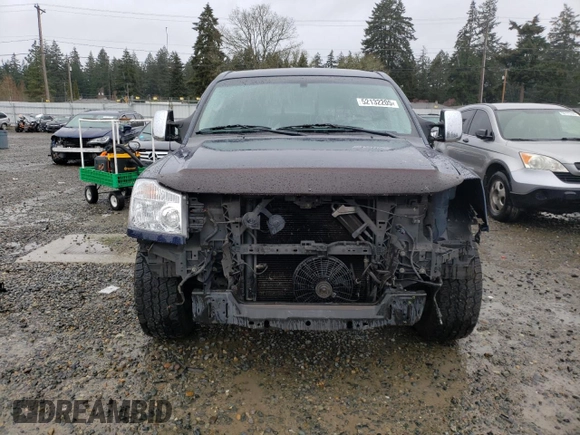 2006 Nissan Titan SE with VIN 1N6AA06A06N534206, listed as a Copart auction lot 52132205 with 167,204 mi miles and Salvage title. Bid and sale history available at DreamBid. Image 5.