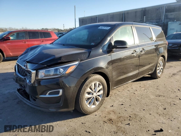 2021 Kia Sedona LX with VIN KNDMB5C12M6668527, listed as a Copart auction lot 84026154 with 165,585 mi miles and Salvage Title. Bid and sale history available at carsss.com. Image 1.