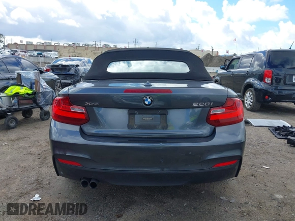 2016 BMW 2 Series 228i xDrive with VIN WBA1L9C5XGV767324, listed as a IAAI auction lot 41795604 with 133,276 mi miles. Bid and sale history available at carsss.com. Image 16.