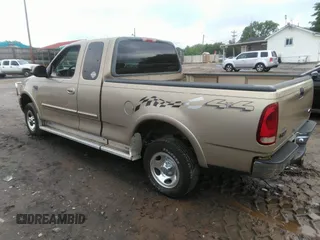 2000 Ford F-150 XL with VIN 1FTRX18L2YNA47066, listed as a IAAI auction lot 42127285 with 1 mi miles. Bid and sale history available at carsss.com. Image 3.