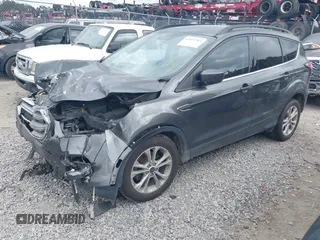 2017 Ford Escape SE z VIN 1FMCU0GD8HUE00754, wystawiony jako IAAI lot #42127911 z przebiegiem 169 487 mil mil oraz . Historia ofert i sprzedaży dostępna na DreamBid. Obrazek 17.