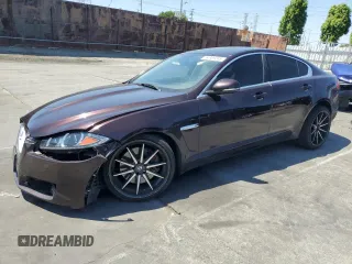 2015 Jaguar XF V6 Portfolio with VIN SAJWA0F79F8U60216, listed as a Copart auction lot 54969245 with 88,954 mi miles and Salvage Title. Bid and sale history available at carsss.com. Image 1.