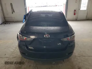 2016 Scion iA z VIN 3MYDLBZV3GY126714, wystawiony jako Copart lot #53955955 z przebiegiem 79 349 mil mil oraz Szkoda całkowita • Salvage title. Historia ofert i sprzedaży dostępna na DreamBid. Obrazek 6.